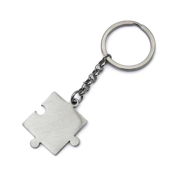 Nemesacél kulcstartó, puzzle design, gravírozható (1 db)