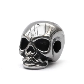 Nemesacél koponya köztes dísz, 11x8x10 mm, 1 db