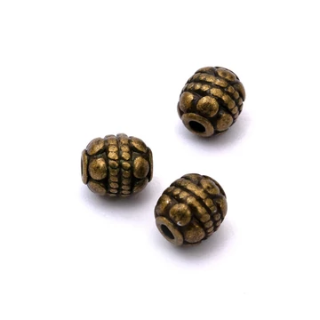 Mintás golyó köztes dísz, bronz szín, 5-6 mm, 10 db