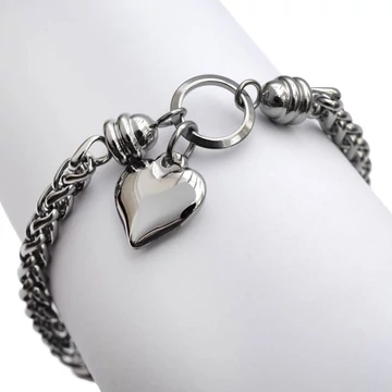 Nemesacél, vastag fonott szemes, karikával,szív medállal, ezüst színű karkötő, kb. 17-21 cm