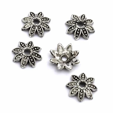 Virág mintás gyöngykupak, antikolt ezüst szín, virág 7x2 mm, 10 db