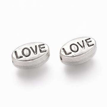 Ovál love (ezüst szín) köztes dísz, 10x6x4 mm (10 db)