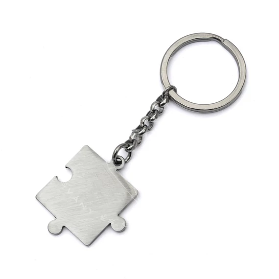 Nemesacél kulcstartó, puzzle design, gravírozható (1 db)