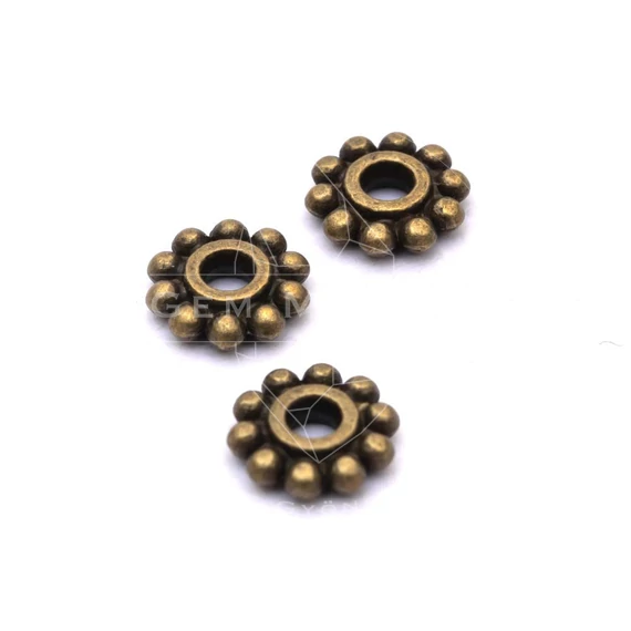 Bali gyöngy köztes dísz, bronz szín, 6,5 mm, 20 db