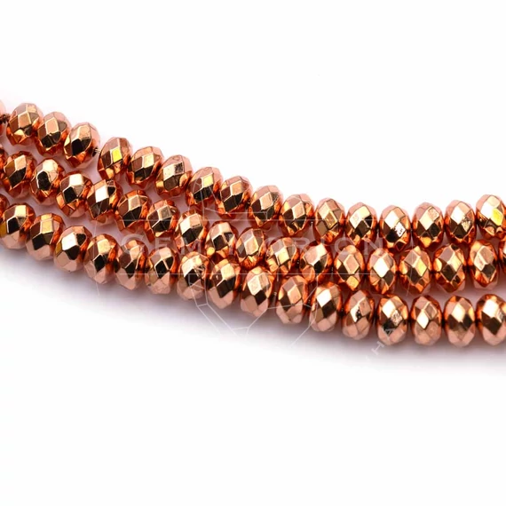 Hematit button szál, rosegold aranyozott, 18K, fazettált, 4x6 mm, kb. 38 cm