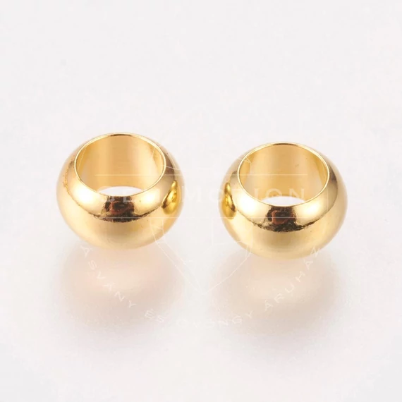 Kerek (arany szín) köztes dísz, 7x4 mm (5 db)