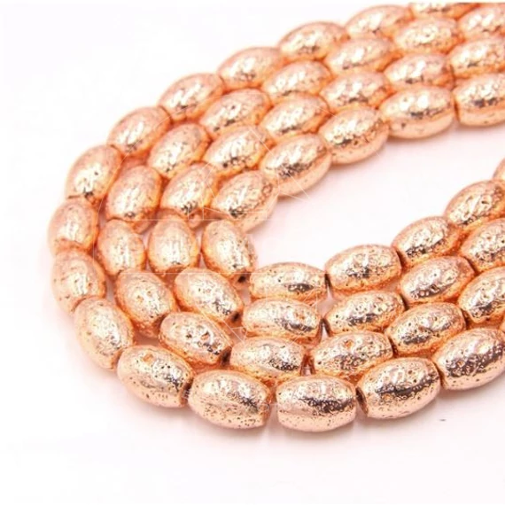 Lávakő (rosegold) hordó köztes dísz, 14x10 mm (2 db)