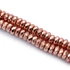Hematit button szál, rosegold szín, fazettált, 6x3 mm, kb. 19 cm