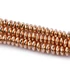 Hematit button szál, rosegold szín, fazettált, 8x3 mm, kb. 19 cm
