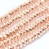 Hematit button szál, rosegold szín, fazettált, 8x3 mm, kb. 19 cm